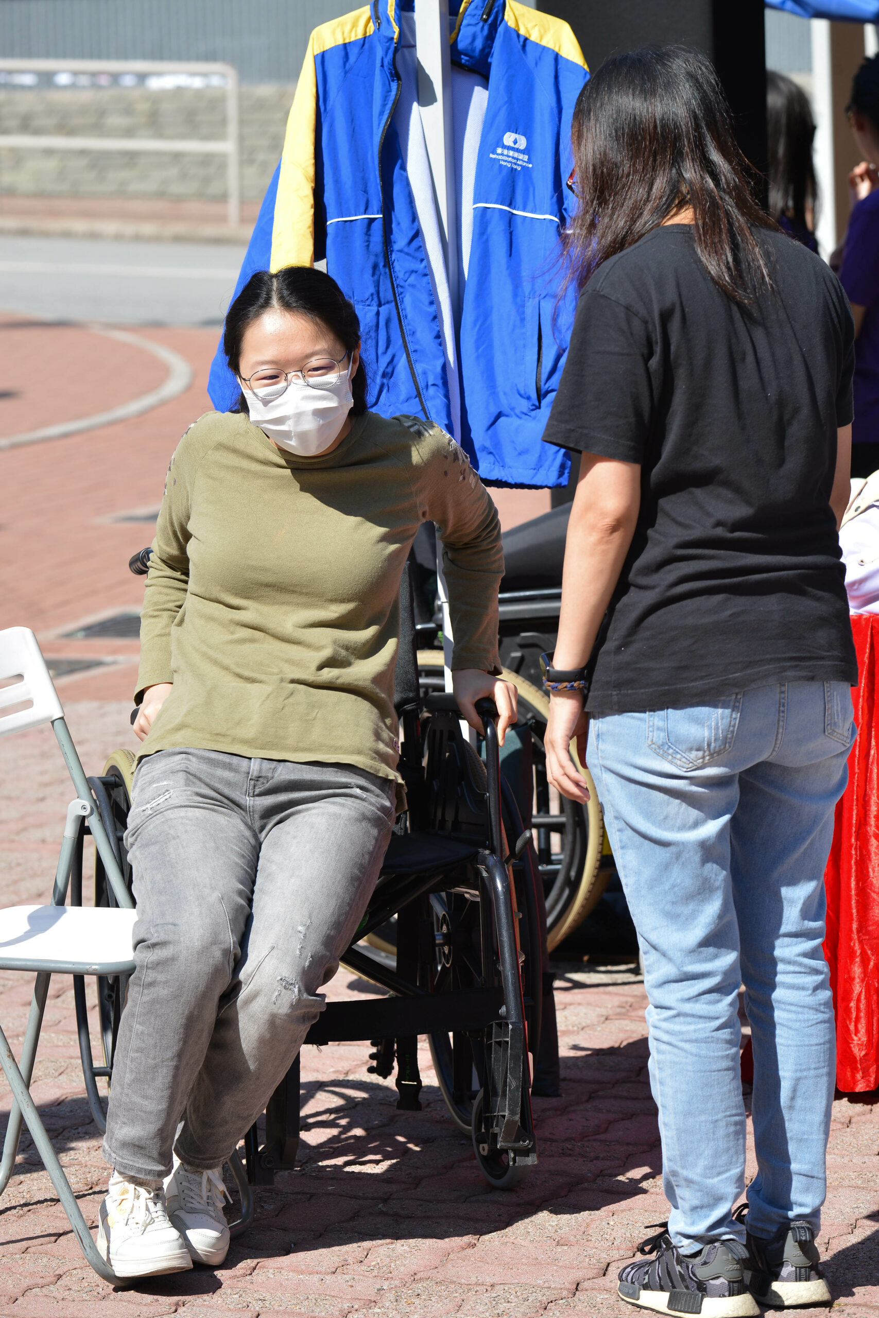 Participants at D&I Carnival 2024 are engaging in the wheelchair experience workshop.